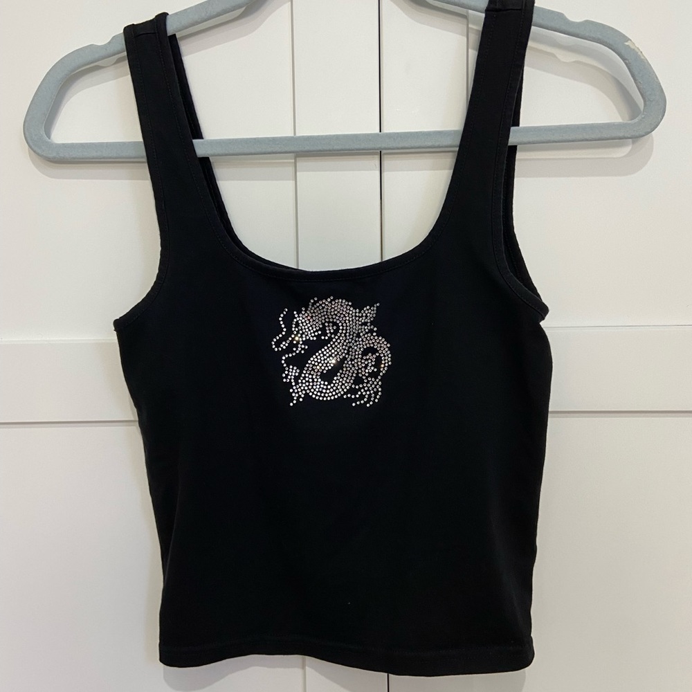 Cropped take with a rhinestone dragon print